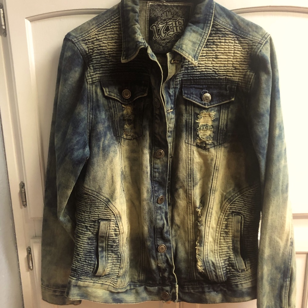 Medium distressed blue denim jacket, oversized medium